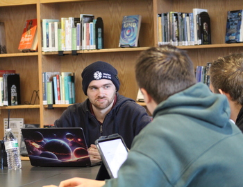 Students talking to a local EMS