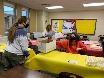 students packing water filters