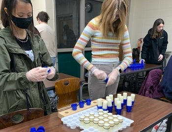 students assembling water filters