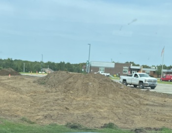Grass torn up for improved parking lot
