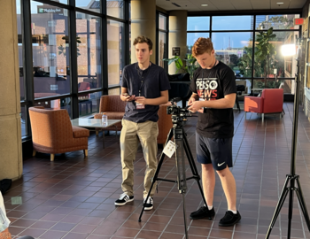 2 high school students recording an interview