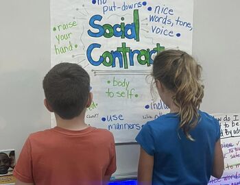 Two Steeby students signing their Social Contact