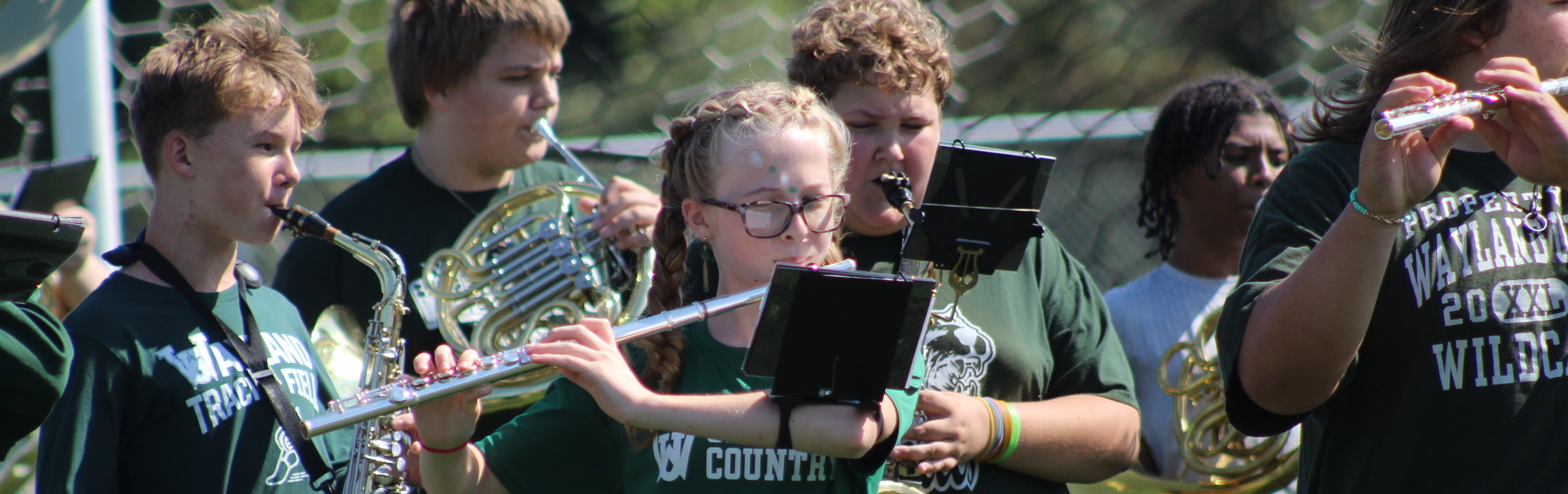 MS band students preforming at Homecoming assembly
