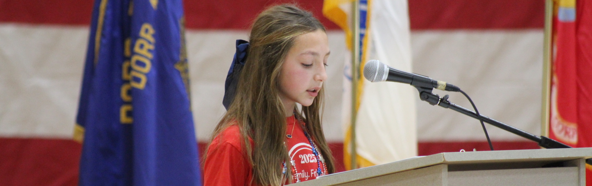 5th Grade Student Presenting during the Veterans Assembly