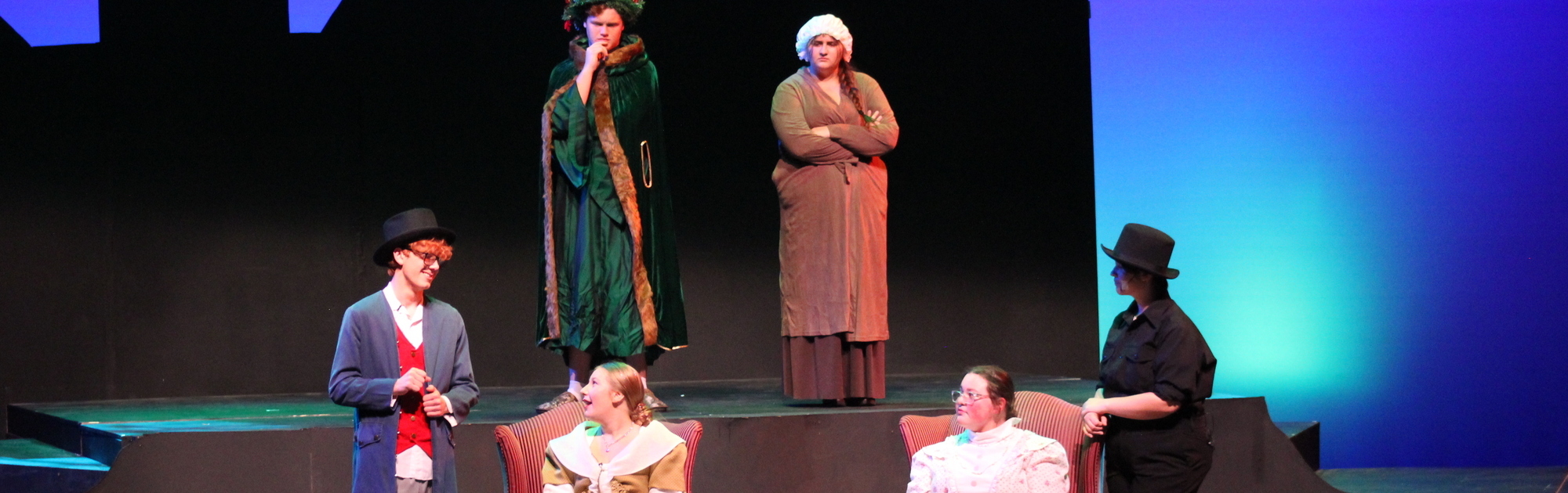 Actors on stage for high school Christmas play