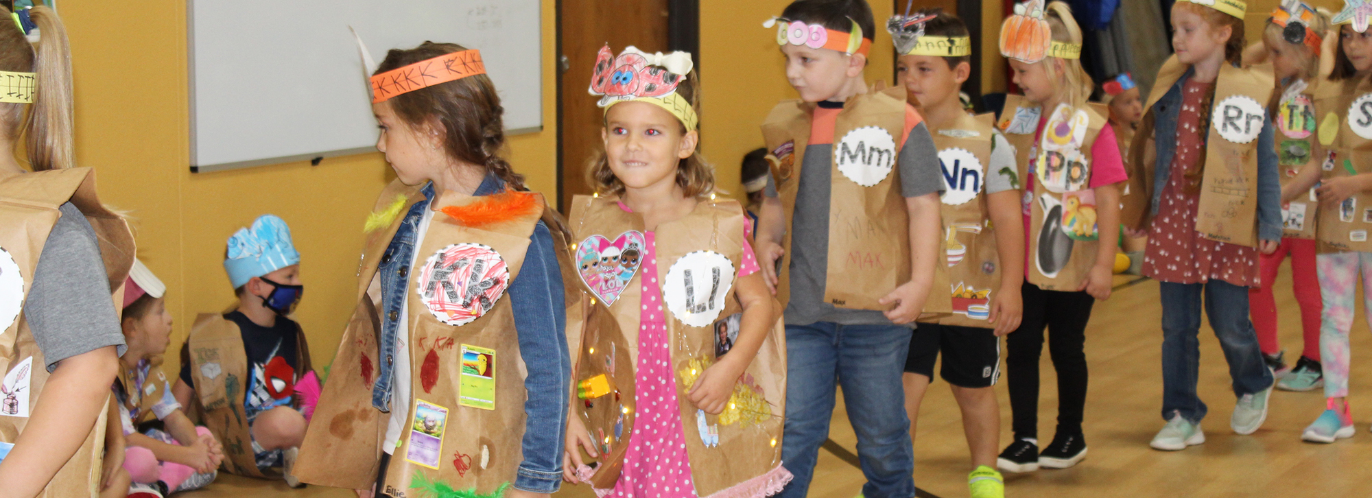 kindergarten students in the ABC outfits