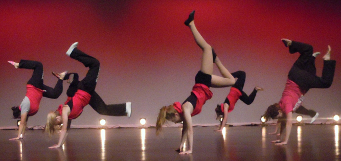 photo of dance students performing on stage.