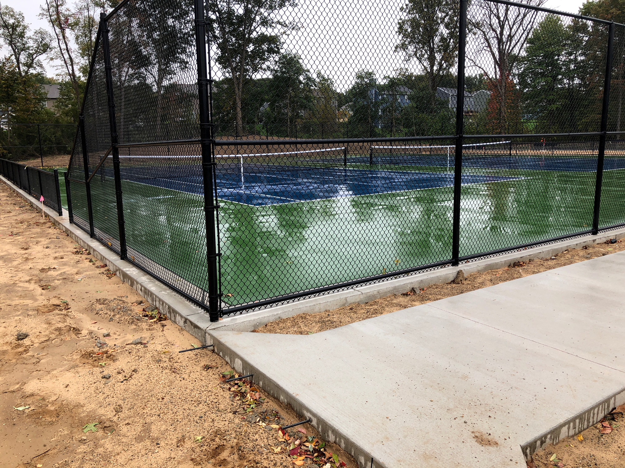 new tennis courts are painted