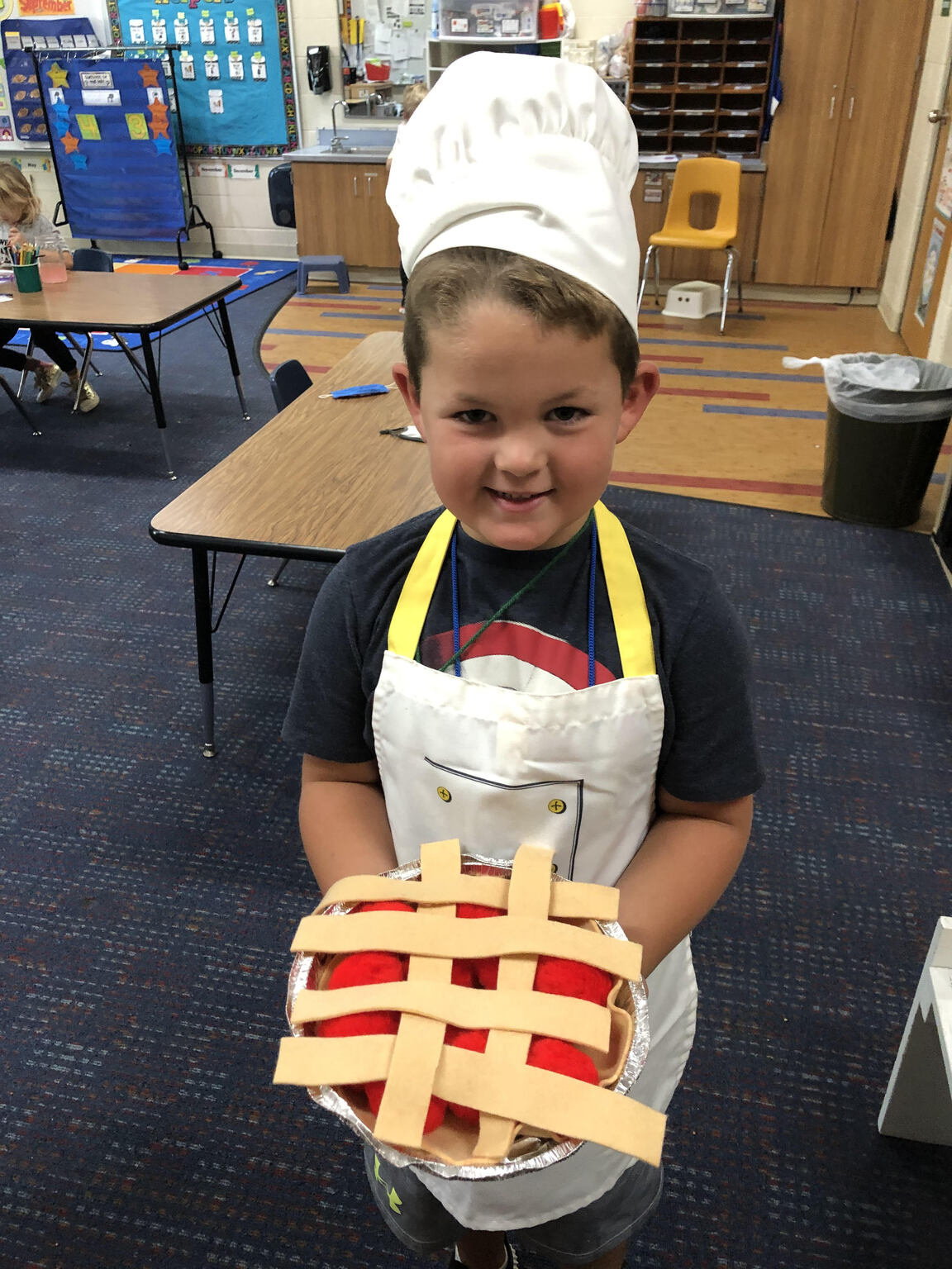student dressed up like a chef